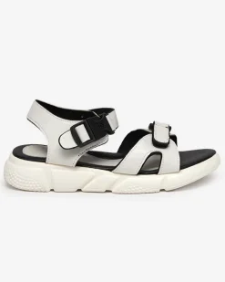 Royalfashion Dziecięce błyszczące sandały w kolorze białym Leepe