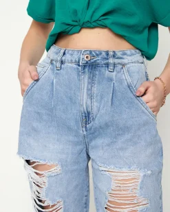 Royalfashion Jasnoniebieskie damskie spodnie jeansowe z dziurami
