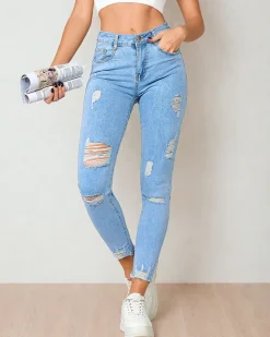 Royalfashion Jeansy damskie typu rurki z przetarciami