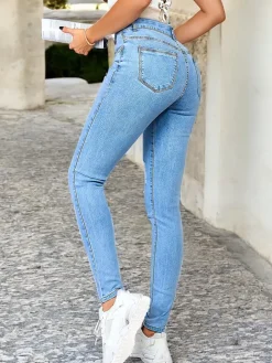 Royalfashion Jeansy damskie typu rurki z przetarciami 5717-6