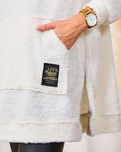 Royalfashion Kremowy długi sweter damski z kapturem