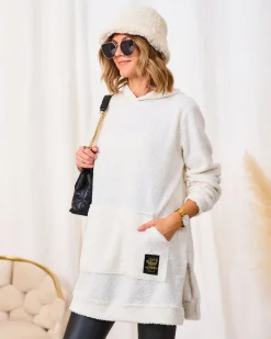 Royalfashion Kremowy długi sweter damski z kapturem