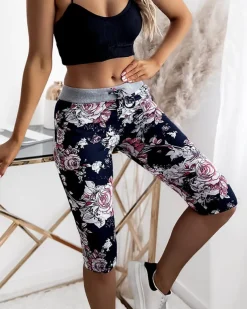 Royalfashion Kwiatowe spodenki damskie 3/4 w kolorze granatowo- koralowym