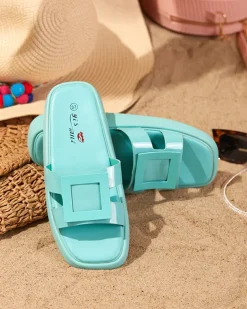 Royalfashion Miętowe damskie klapki z ozdobą Zegora