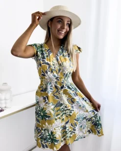 Royalfashion Musztardowa sukienka damska mini z printem w kwiaty