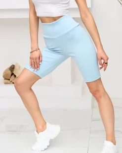 Royalfashion Niebieskie damskie prążkowane legginsy kolarki