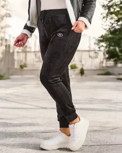 Royalfashion Ocieplane spodnie dresowe damskie PLUS SIZE