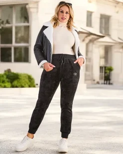 Royalfashion Ocieplane spodnie dresowe damskie PLUS SIZE