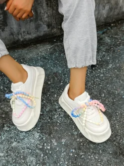 Royalfashion Sportowe sneakersy damskie na platformie z ozdobnymi sznurówkami Funies