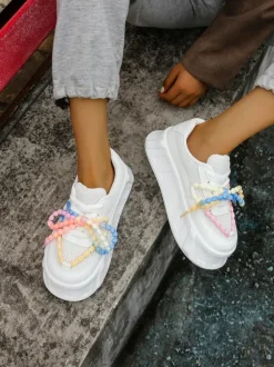 Royalfashion Sportowe sneakersy damskie na platformie z ozdobnymi sznurówkami Funies