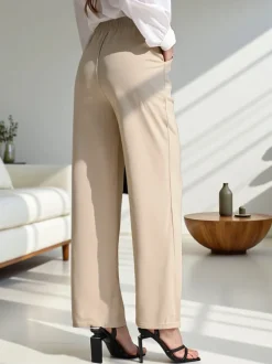 Royalfashion Szerokie spodnie damskie z wiązaniem po boku