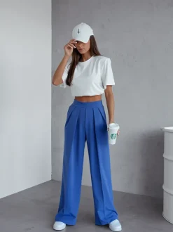 Royalfashion Szerokie spodnie damskie w kant