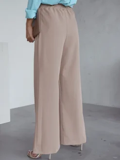 Royalfashion Szerokie spodnie damskie w kant