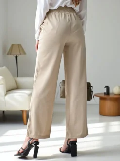 Royalfashion Szerokie spodnie damskie z ozdobną klamerką