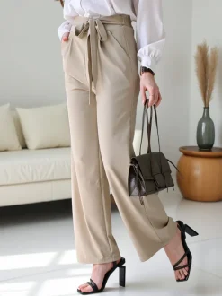 Royalfashion Szerokie spodnie damskie z paskiem