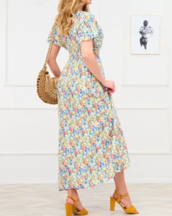 Royalfashion Żółta damska sukienka maxi w kwiaty