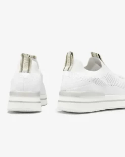 Royalfashion Wsuwane buty sportowe damskie z napisami w kolorze białym Cerppa