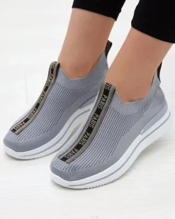 Royalfashion Wsuwane buty sportowe damskie z napisami w kolorze szarym Cerppa