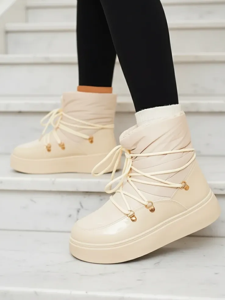 Royalfashion Wsuwane śniegowce damskie w kremowym kolorze Dabenda