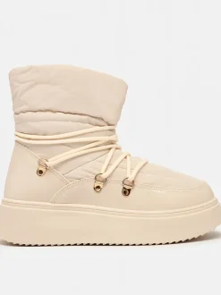 Royalfashion Wsuwane śniegowce damskie w kremowym kolorze Dabenda