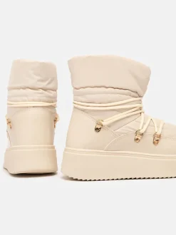 Royalfashion Wsuwane śniegowce damskie w kremowym kolorze Dabenda