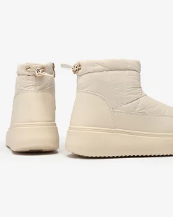 Royalfashion Wsuwane śniegowce damskie w kremowym kolorze Armeda