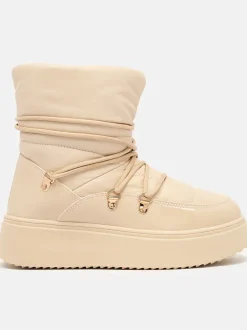 Royalfashion Wsuwane śniegowce damskie w beżowym kolorze Dabenda