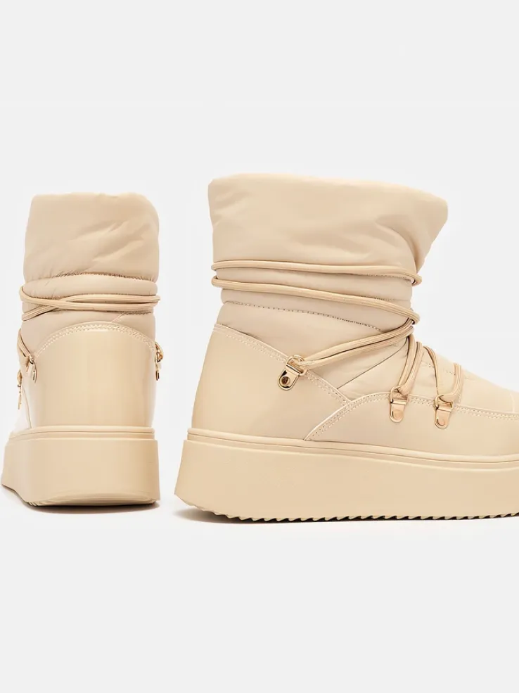 Royalfashion Wsuwane śniegowce damskie w beżowym kolorze Dabenda