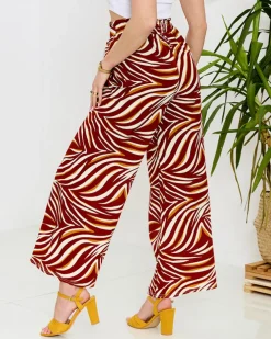 Royalfashion Wzorzyste spodnie damskie typu palazzo w kolorze czerwonym