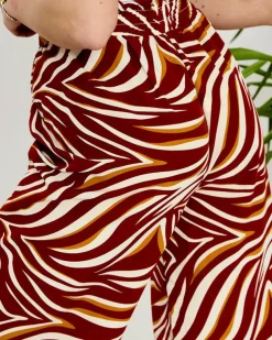 Royalfashion Wzorzyste spodnie damskie typu palazzo w kolorze czerwonym