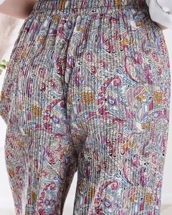 Royalfashion Wzorzyste szerokie spodnie damskie w kolorze kremowym