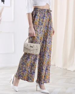 Royalfashion Wzorzyste szerokie spodnie damskie w kolorze żółtym