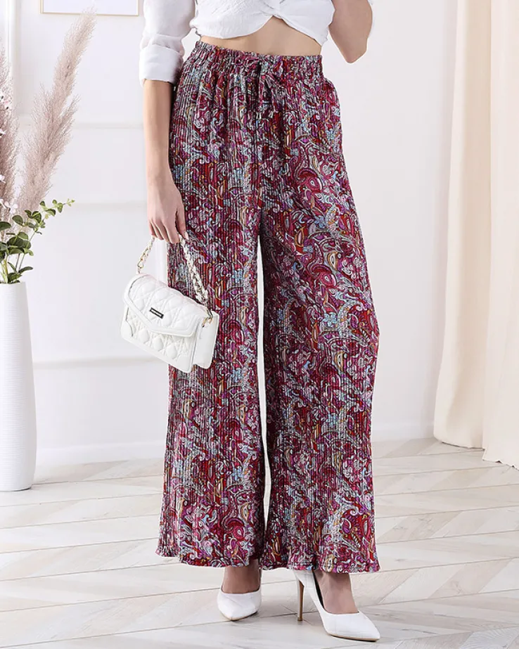 Royalfashion Wzorzyste szerokie spodnie damskie w kolorze czerwonym