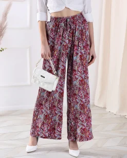 Royalfashion Wzorzyste szerokie spodnie damskie w kolorze czerwonym