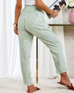 Royalfashion Zielone damskie bawełniane spodnie w kwiaty