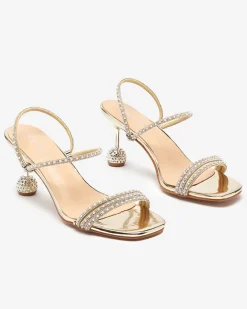 Royalfashion Złote lakierowane klapki na niskim obcasie Lakopi